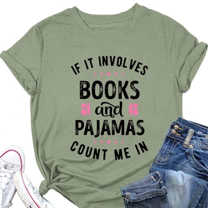 Detail view of sage green cotton T-shirt with 'books and pajamas' slogan and accessories
