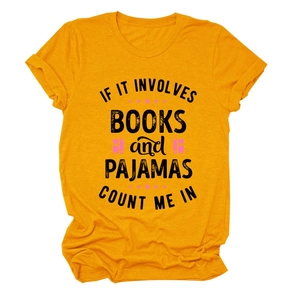 Detail of ginger yellow cotton T-shirt featuring rolled cuffs and printed slogan
