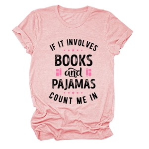 Detail of pink cotton t-shirt with books and pajamas text and soft heathered texture