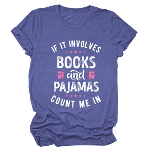 Close-up of violet blue graphic t-shirt with books and pajamas slogan print detail