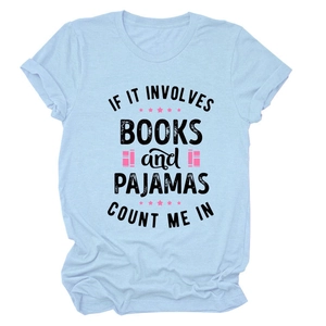 Detail of light blue cotton T-shirt featuring 'Books and Pajamas' slogan and graphic print