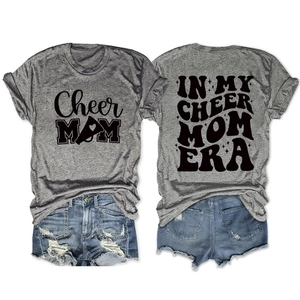 Front and back detail of grey Cheer Mom Era t-shirt with blue ripped denim shorts