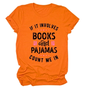 Close-up of vibrant orange T-shirt featuring 'If it involves books and pajamas' text