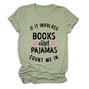 Detail view of cotton t-shirt with books and pajamas slogan print and pink graphics
