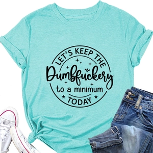 Detail of light blue T-shirt featuring a graphic slogan print and stylish side knot