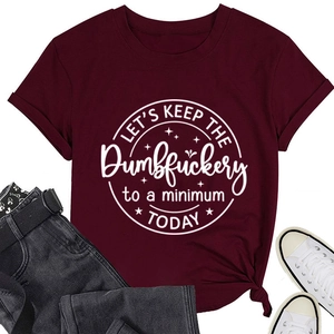 Close-up of the white graphic print on a burgundy cotton t-shirt with soft fabric texture