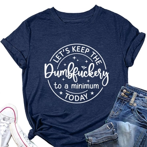 Detail of navy blue cotton t-shirt featuring white slogan print and stars decoration