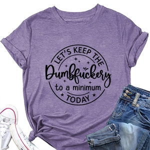 Detail of purple cotton T-shirt featuring funny black quote print and a front knot design