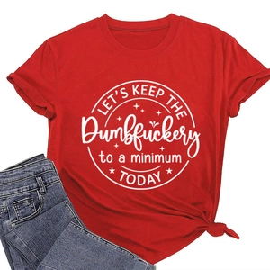 Detail of red crew neck T-shirt with white slogan print and denim jeans styling
