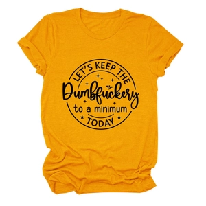 Close-up of black circular slogan print on ginger yellow cotton short sleeve T-shirt