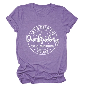 Close-up of white circular graphic print and heather purple fabric on summer cotton t-shirt