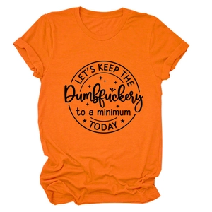 Detail of soft orange cotton T-shirt featuring black circular slogan graphic print
