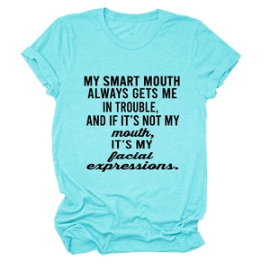 Detail of blue cotton T-shirt featuring funny text print and smooth crew neck fabric
