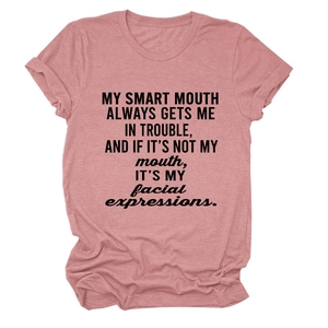 Close-up of pink casual T-shirt featuring My Smart Mouth Always Gets Me slogan print