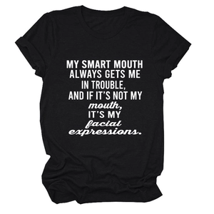 Close-up of text print on black cotton crew neck t-shirt with funny slogan detail