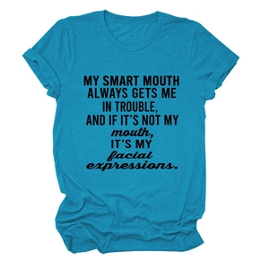 Close-up of humorous text print on blue cotton T-shirt with comfortable round neckline