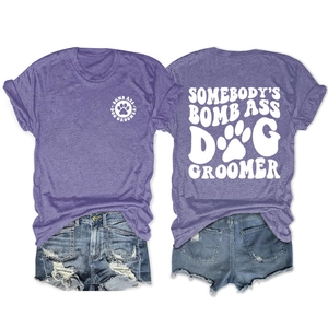 Detail of dog groomer print on purple heather t-shirt and distressed denim shorts set