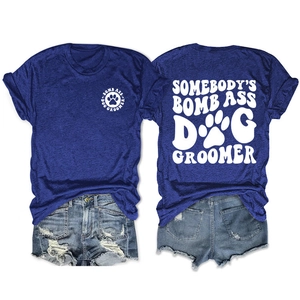Royal blue dog groomer t-shirt featuring front logo and large back graphic print