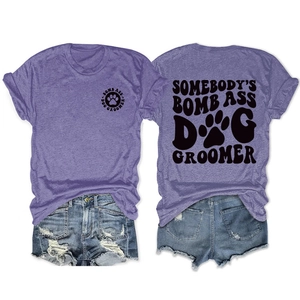 Front and back view of heather purple Dog Groomer t-shirt with bold graphic text