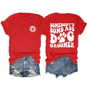 Front and back view of red cotton T-shirt with dog groomer slogan and denim shorts