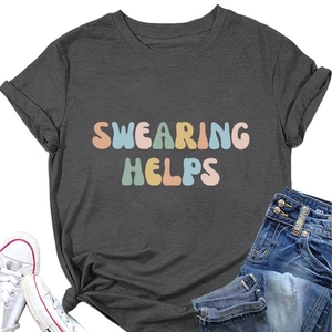 Flat lay of dark grey cotton t-shirt with colorful swearing helps text and denim jeans