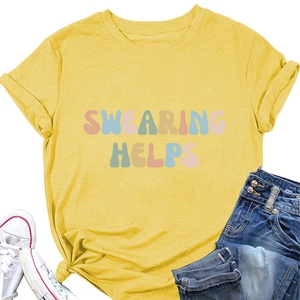 Detail of yellow cotton t-shirt with swearing helps print and side knot on white background
