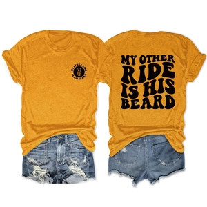 Front and back view of orange t-shirt with beard slogan and distressed denim shorts