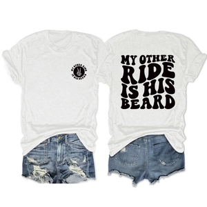 Detail of white printed T-shirt and distressed denim shorts with fringe hem