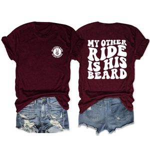 Front and back view of burgundy t-shirt with My Other Ride Is His Beard print and denim shorts
