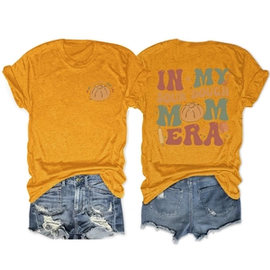 Detail of In My Sourdough Mom Era print on the back of a vintage yellow cotton T-shirt