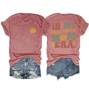 Detail of vintage sourdough mom era graphic print on rust red cotton crew neck t-shirt
