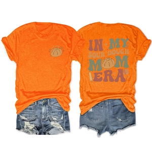 Detail view of orange T-shirt with vintage sourdough mom baking prints on front and back