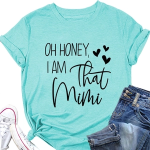 Detail of teal crew neck t-shirt with Oh Honey I Am That Mimi lettering and heart print