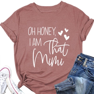 Close-up of pink casual t-shirt with Oh Honey I Am That Mimi white typography and heart
