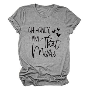 Close-up of the black 'OH HONEY, I AM That Mimi' print on a soft grey cotton t-shirt