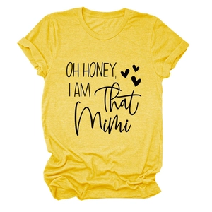 Detail of ginger yellow t-shirt showing the Oh Honey I Am That Mimi print and crew neck
