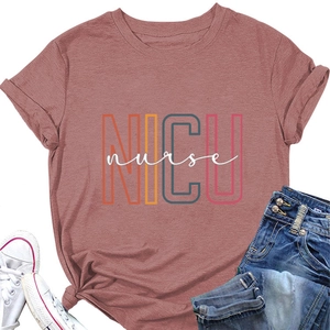 Flat lay of pink cotton t-shirt with colorful NICU nurse print and denim jeans