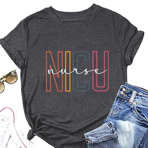Detailed flat lay of dark gray NICU nurse t-shirt with sneakers and sunglasses