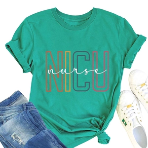 Flat lay of green NICU nurse T-shirt with casual denim jeans and white sneakers