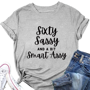 Close-up of Sixty Sassy slogan print on grey cotton t-shirt with denim shorts
