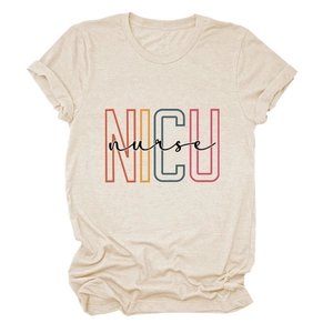 Detail of beige NICU nurse graphic on a cotton blend crewneck t-shirt with folded sleeves