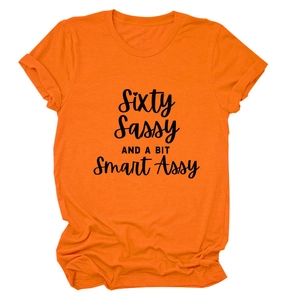 Detail of orange round neck cotton T-shirt with black Sixty Sassy printed slogan