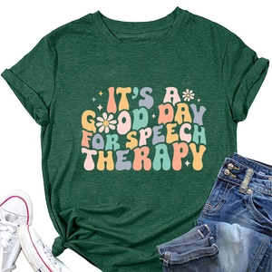 Close-up of retro colorful lettering on a dark green cotton speech therapy T-shirt