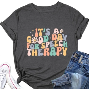 Close-up of retro floral text on charcoal grey t-shirt with trendy knotted hem detail