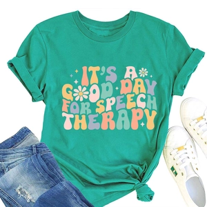 Flat lay of a mint green Speech Therapy T-shirt paired with denim jeans and sneakers