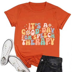 Detail of orange cotton T-shirt featuring retro colorful IT'S A GOOD DAY FOR SPEECH text