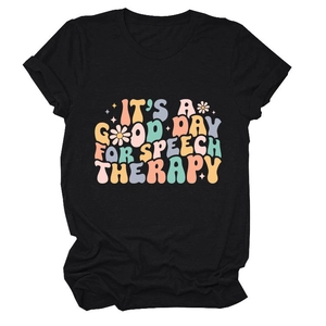 Detail of retro colorful typography and floral pattern on black cotton speech therapy tee