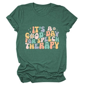 Detailed flat lay of dark green speech therapy t-shirt with vintage floral typography