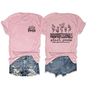 Close-up of pink Paraprofessional floral print t-shirt and frayed denim shorts