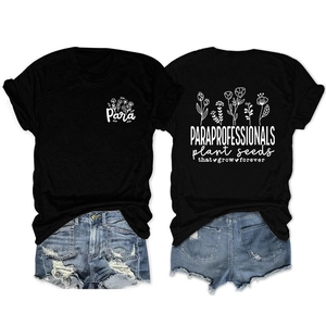 Detailed view of black Paraprofessionals floral print T-shirt and ripped denim shorts set